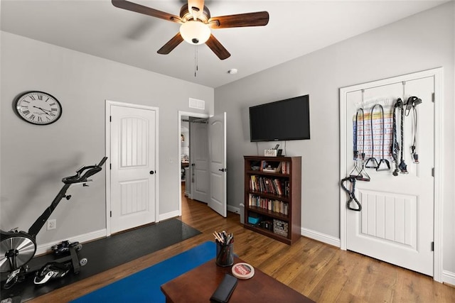 2213 Independence Ln, Buford, GA 30519 - exercise room with a ceiling fan and wood finished floors