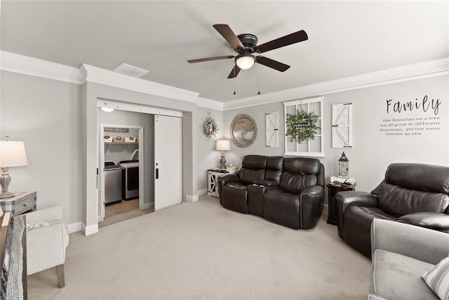 2213 Independence Ln, Buford, GA 30519 - living area with light carpet, separate washer and dryer, a ceiling fan, and crown molding