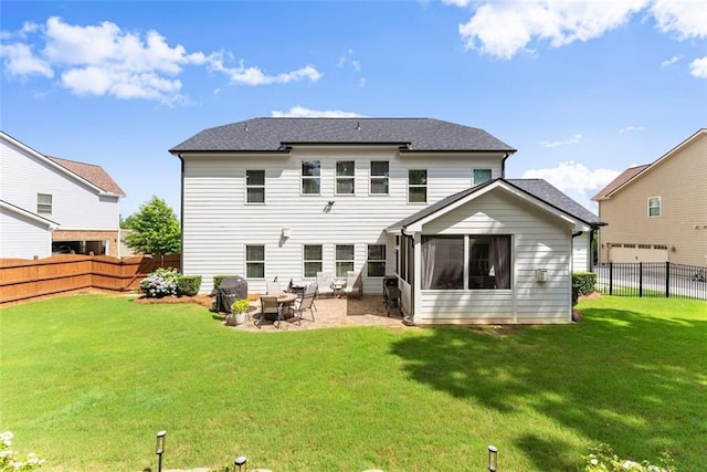 2213 Independence Ln, Buford, GA 30519 - rear view of property featuring a fenced backyard, a patio area, and a sunroom