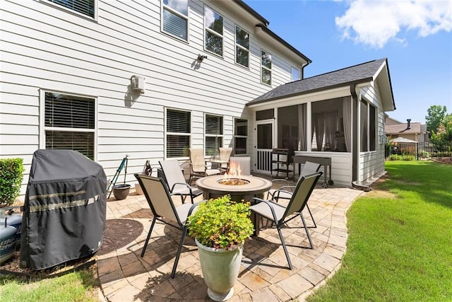 2213 Independence Ln, Buford, GA 30519 - view of patio / terrace with a fire pit, a sunroom, and a grill