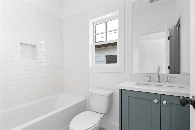 bathroom with vanity, visible vents, toilet, and shower / washtub combination