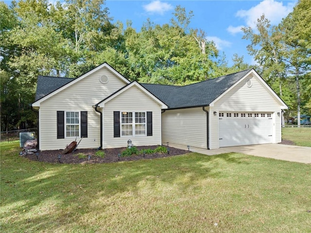 single story home featuring a front yard and a garage