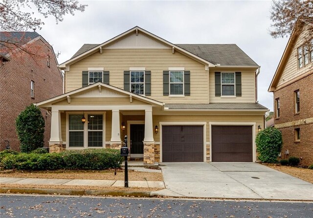 craftsman-style house featuring a garage