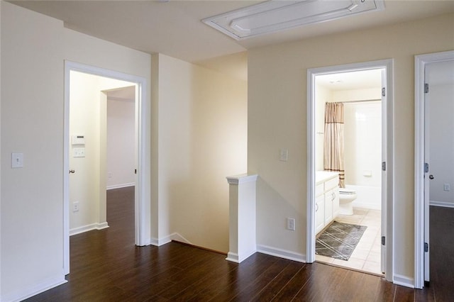 hallway featuring dark wood-type flooring