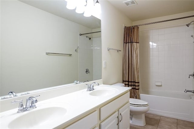 full bathroom with tile patterned flooring, vanity, shower / bath combination with curtain, and toilet