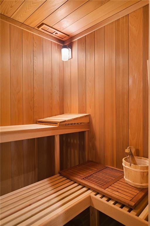 view of sauna featuring wooden ceiling