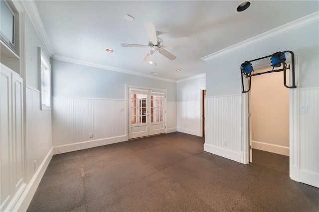 empty room with ceiling fan and ornamental molding