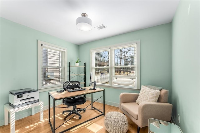 home office featuring light wood-type flooring