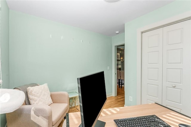 home office with light wood-type flooring