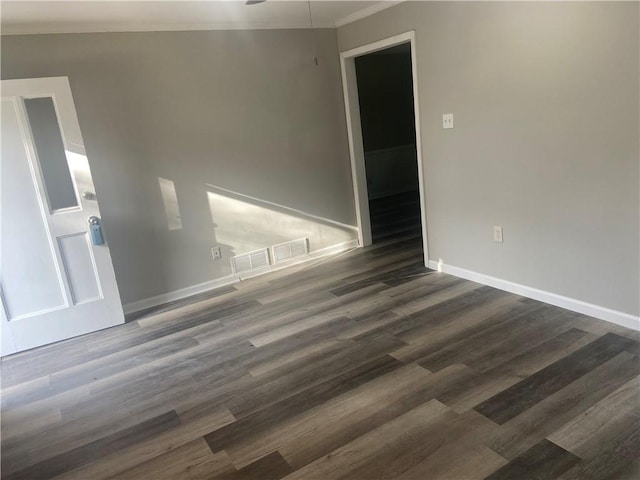 1905 Robinhill Ct, Tucker, GA 30084 - empty room with crown molding, baseboards, and dark wood finished floors