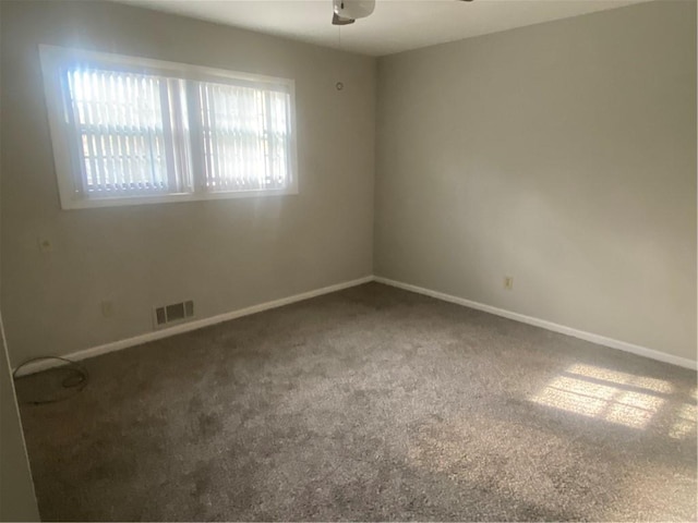 1905 Robinhill Ct, Tucker, GA 30084 - unfurnished room with carpet flooring, a ceiling fan, and baseboards