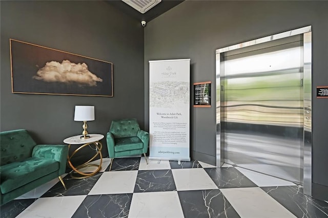 8200 Main St Unit 1206, Woodstock, GA 30188 - living area with elevator and marble tiled flooring