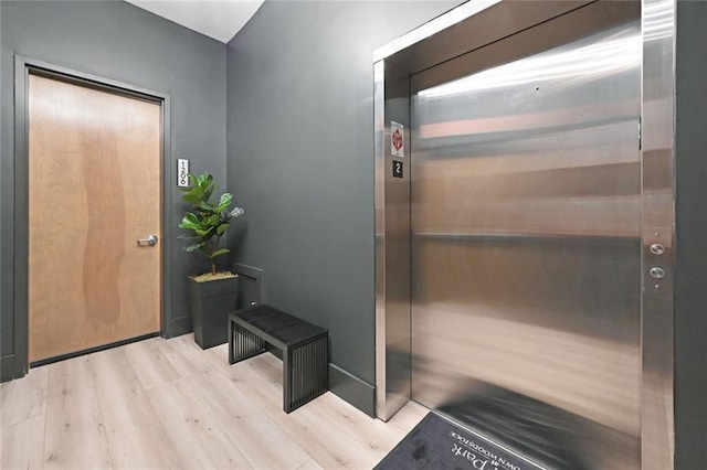 8200 Main St Unit 1206, Woodstock, GA 30188 - elevator with wood finished floors