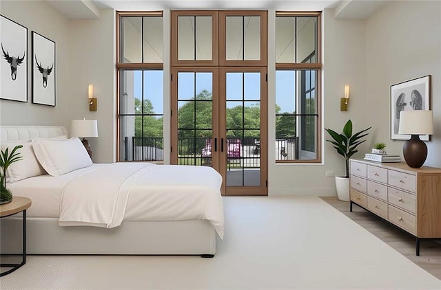8200 Main St Unit 1206, Woodstock, GA 30188 - bedroom with french doors, access to exterior, and baseboards