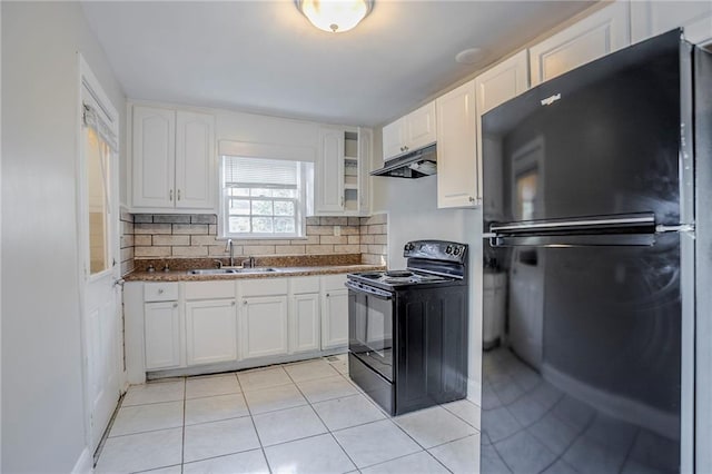 kitchen featuring under cabinet range hood, a sink, white cabinets, backsplash, and black appliances