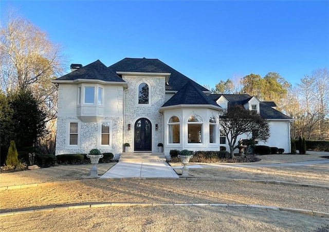2470 Hopewell Plantation Dr, Alpharetta, GA 30004 - french country home featuring roof with shingles
