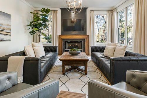 2470 Hopewell Plantation Dr, Alpharetta, GA 30004 - living room featuring a chandelier