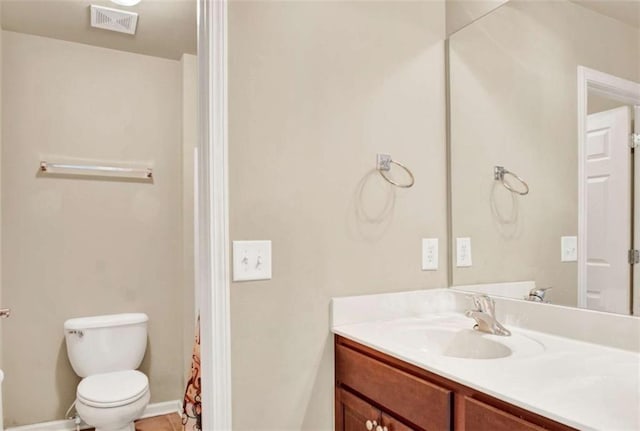 2685 Sardis Chase Ct, Buford, GA 30519 - full bath featuring toilet, vanity, and a shower with shower curtain