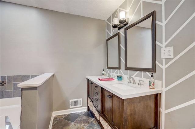 151 Quail Hollow Dr, Dallas, GA 30157 - full bath featuring double vanity, stone finish flooring, and a tub to relax in