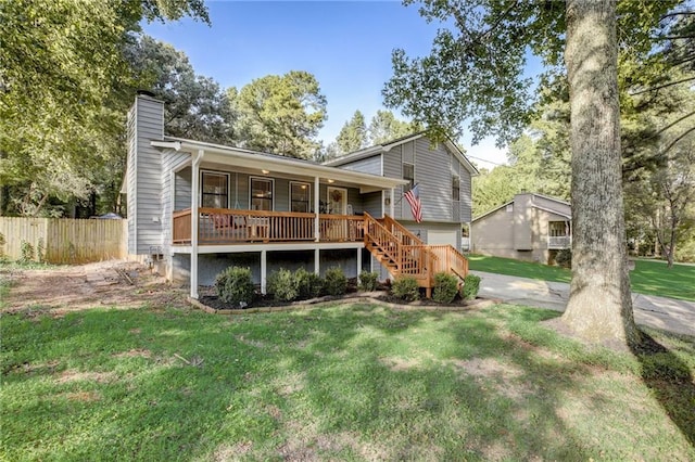 151 Quail Hollow Dr, Dallas, GA 30157 - back of house with covered porch, a chimney, and stairway