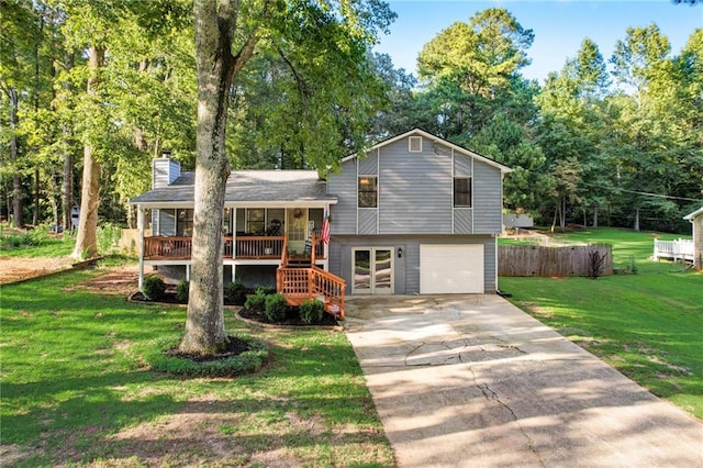 151 Quail Hollow Dr, Dallas, GA 30157 - split level home featuring driveway, stairway, covered porch, a chimney, and an attached garage