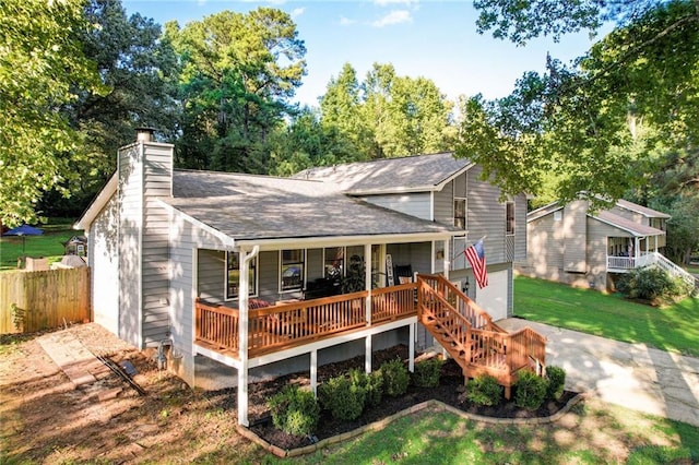 151 Quail Hollow Dr, Dallas, GA 30157 - rear view of house featuring a chimney, a porch, a shingled roof, driveway, and a garage