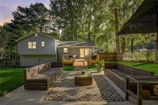 151 Quail Hollow Dr, Dallas, GA 30157 - back of property at dusk featuring an outdoor living space, a deck, and a patio