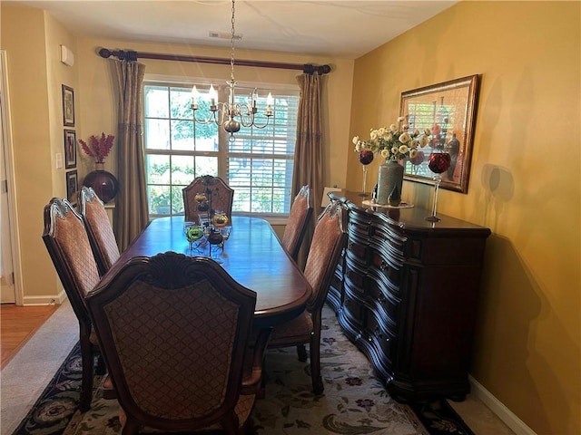 7946 Gossamer, Fairburn, GA 30213 - dining area featuring a chandelier and baseboards