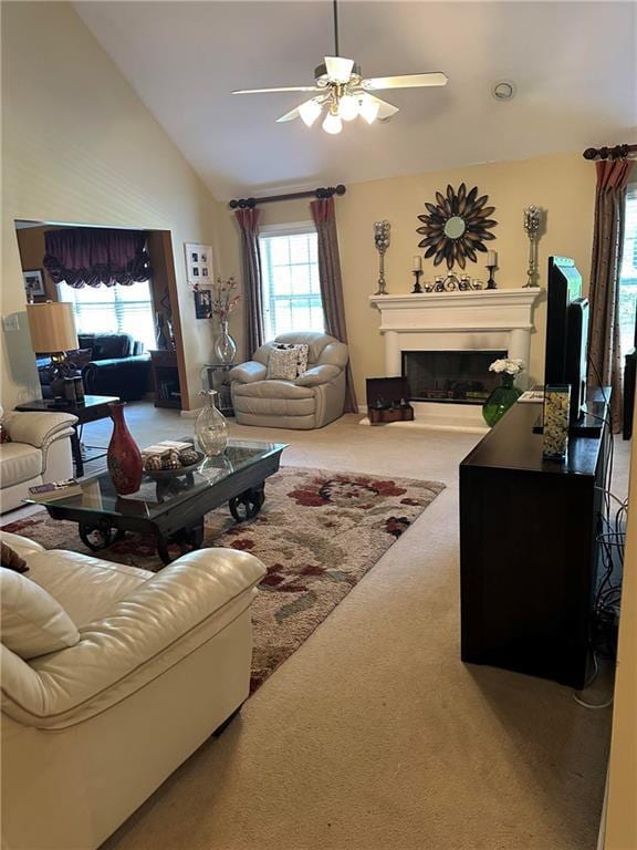 7946 Gossamer, Fairburn, GA 30213 - living area featuring vaulted ceiling, a ceiling fan, carpet, and a fireplace