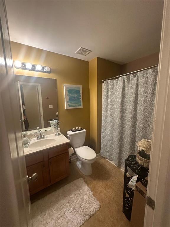 7946 Gossamer, Fairburn, GA 30213 - full bath with vanity, tile patterned flooring, and a shower with shower curtain