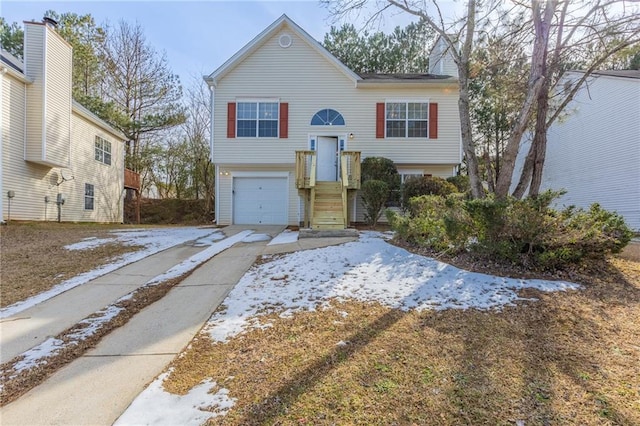 split foyer home featuring a garage