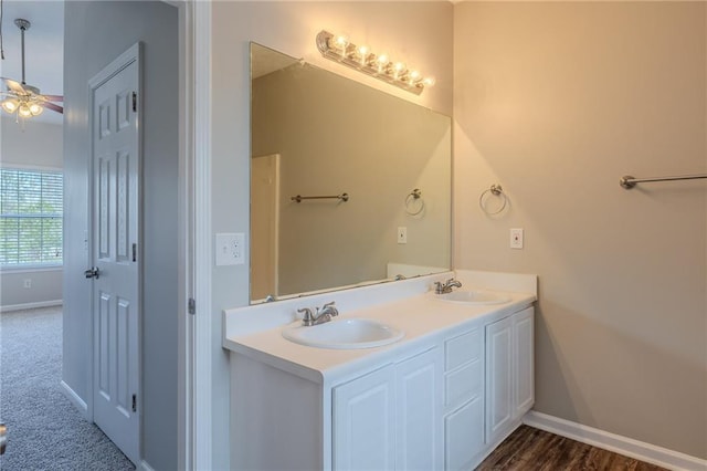 bathroom featuring ceiling fan and vanity