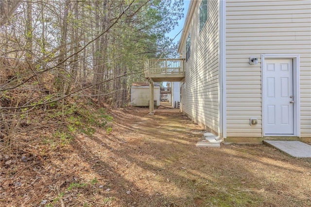 view of home's exterior featuring a deck