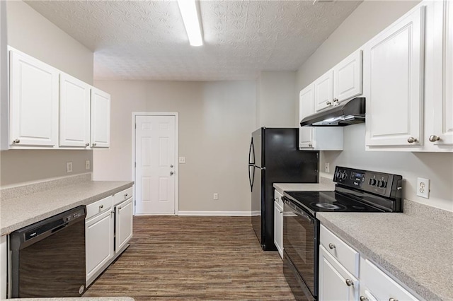 kitchen with a textured ceiling, dark wood-type flooring, white cabinets, and black appliances