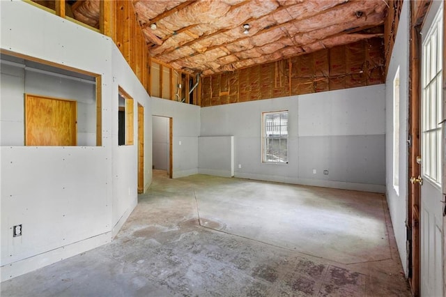 spare room with concrete flooring