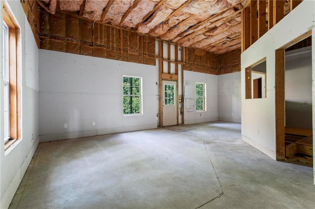 spare room with concrete floors