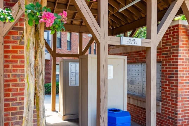 view of patio featuring mail area