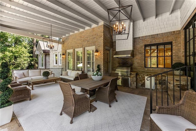 exterior space featuring beam ceiling and a notable chandelier