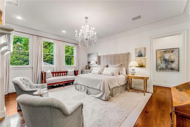 bedroom with crown molding, dark hardwood / wood-style floors, a chandelier, and multiple windows