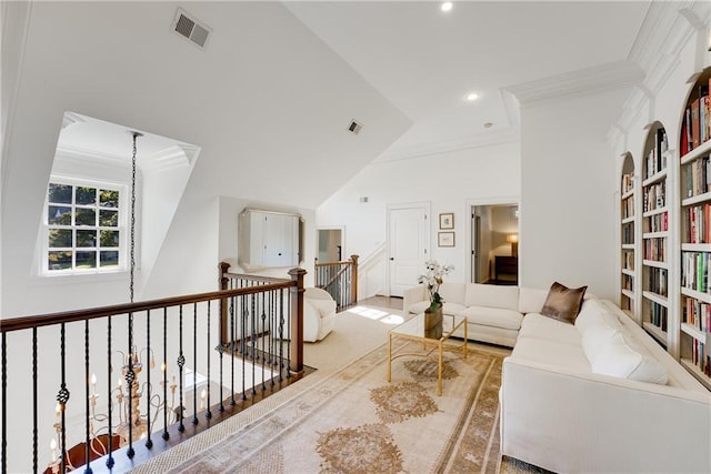 interior space featuring ornamental molding and a chandelier