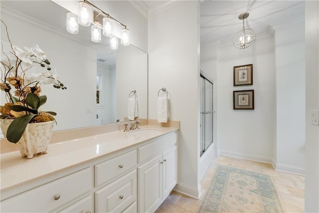 bathroom with vanity and crown molding