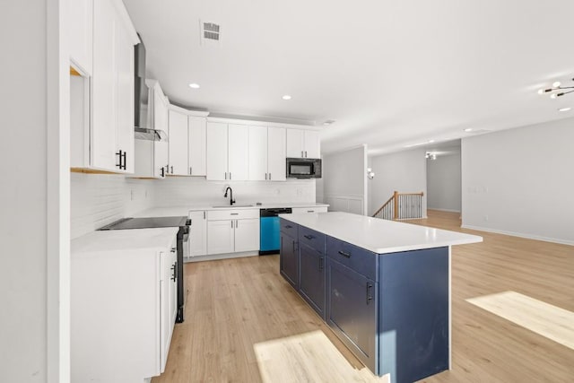 4400 Ross Estates Ct, Snellville, GA 30039 - kitchen featuring dishwasher, black microwave, a sink, stainless steel electric range oven, and a center island