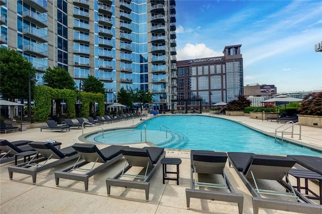 400 W Peachtree St NW Unit 3711, Atlanta, GA 30308 - community pool featuring a patio