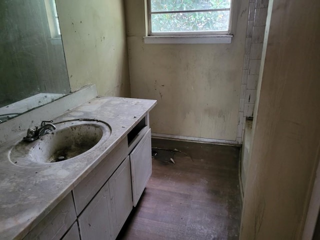 4701 Flat Shoals Rd Unit 56D, Union City, GA 30291 - bathroom with wood finished floors and vanity