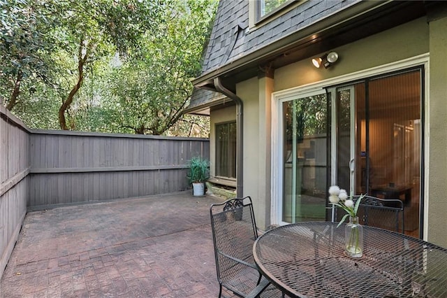 view of patio / terrace with fence