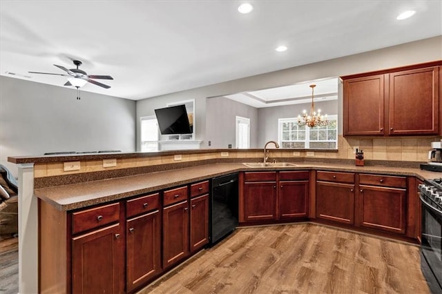 4349 Kousa Rd Unit 4, Austell, GA 30106 - kitchen with black appliances, dark countertops, light wood finished floors, and recessed lighting