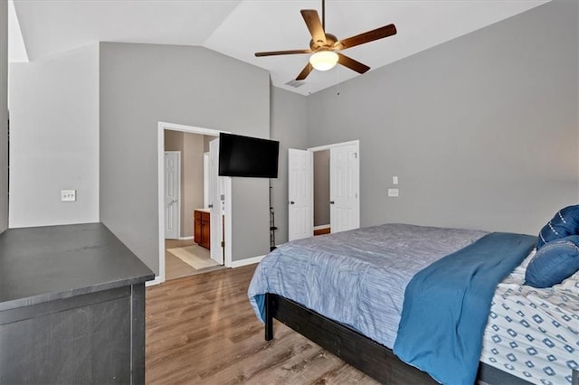 4349 Kousa Rd Unit 4, Austell, GA 30106 - bedroom with wood finished floors, ceiling fan, high vaulted ceiling, and ensuite bath