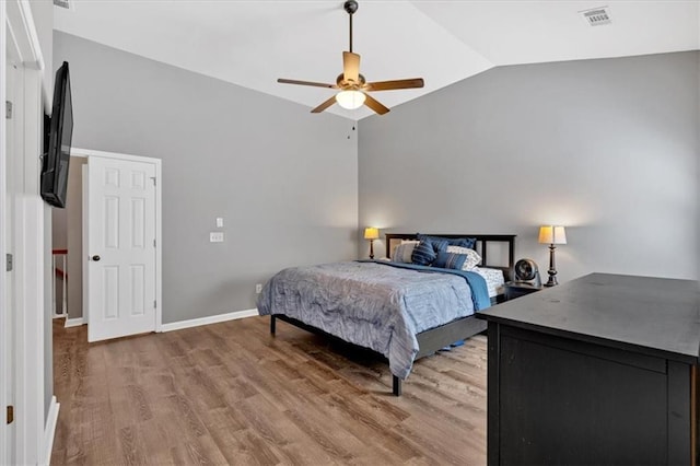 4349 Kousa Rd Unit 4, Austell, GA 30106 - bedroom featuring vaulted ceiling, light wood finished floors, and a ceiling fan