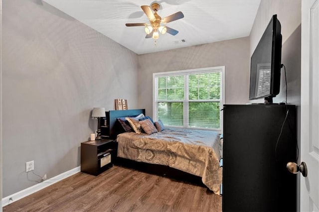 4349 Kousa Rd Unit 4, Austell, GA 30106 - bedroom featuring wood finished floors and a ceiling fan