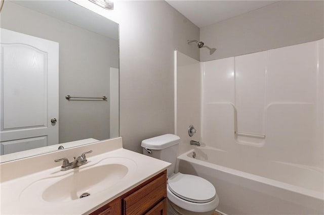 full bathroom with vanity, toilet, and bathtub / shower combination